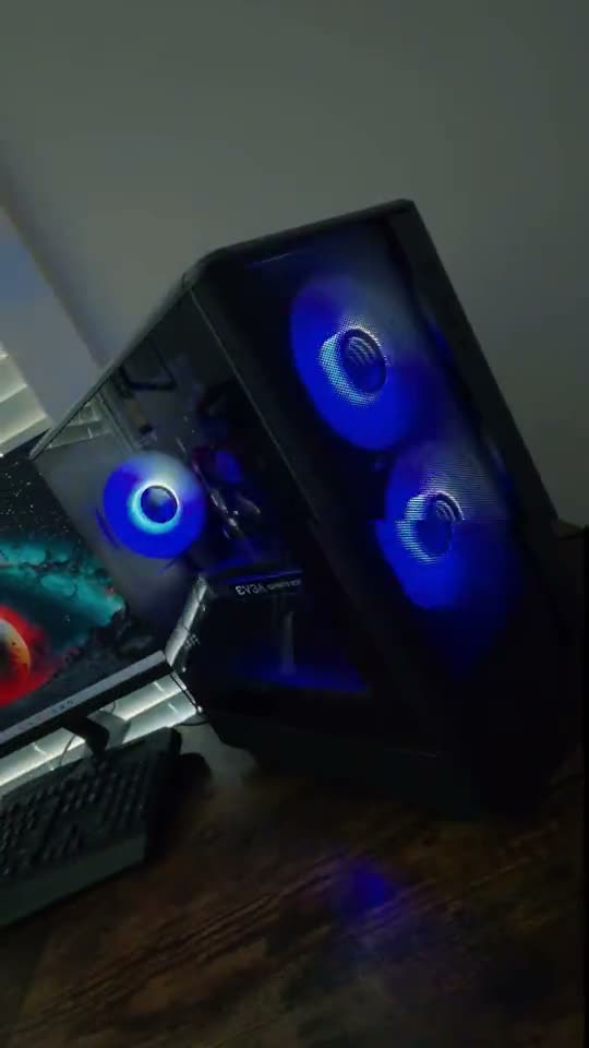 A black case with RGB fans and memory glowing up close.